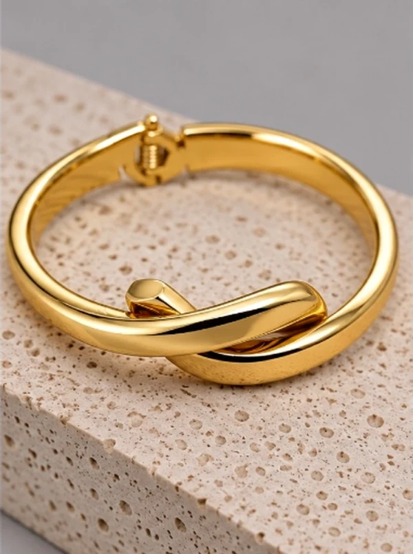 Sculptural Interlocking Knot Hinged Bangle Bracelet